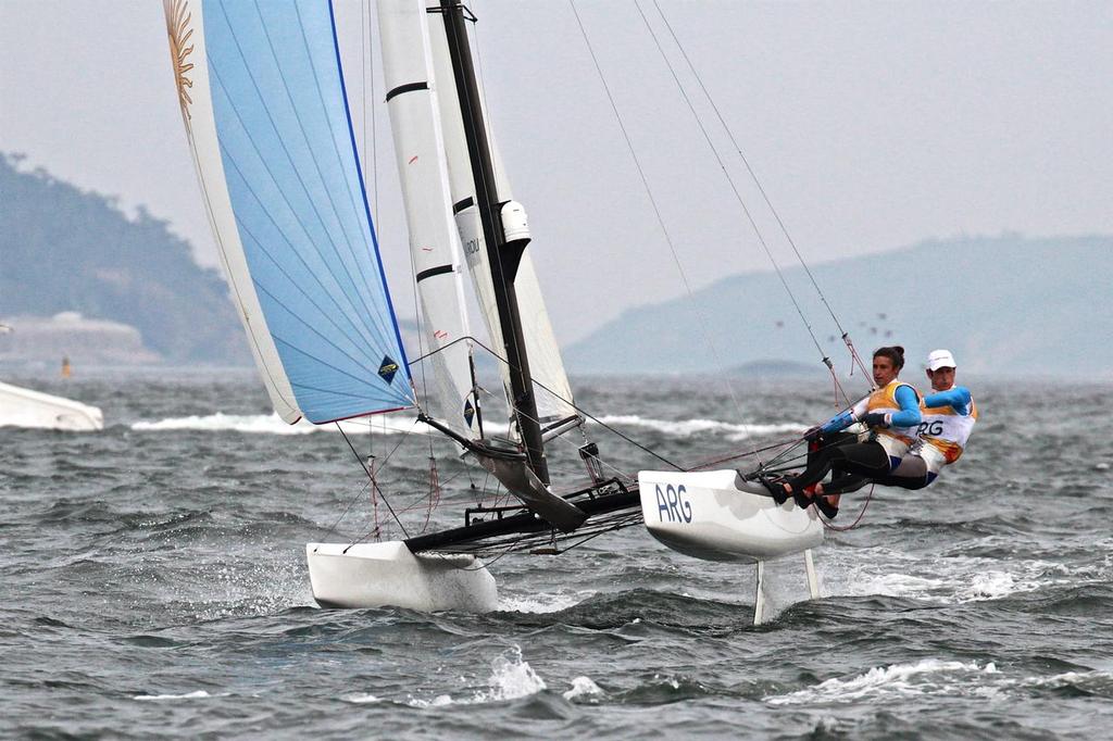 Santiago Lange and Cecilla Saroli about to round the leeward mark in the Nacra 17 Medal race. Summer Olympics © Richard Gladwell www.photosport.co.nz